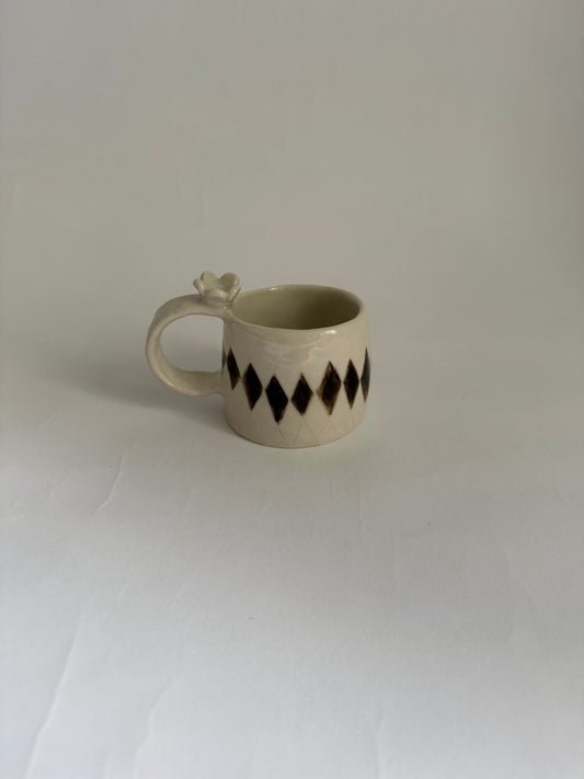 flower topped espresso cup