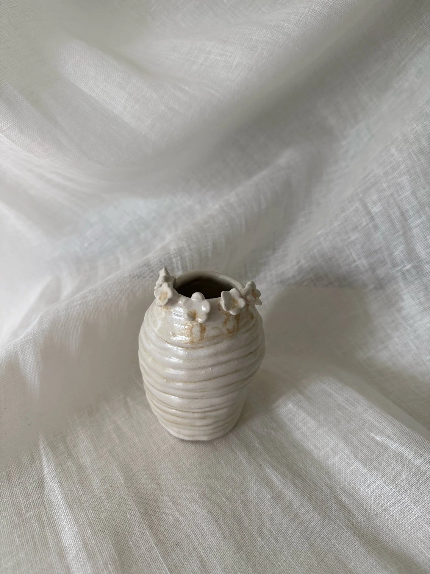 flower rimmed bud vase