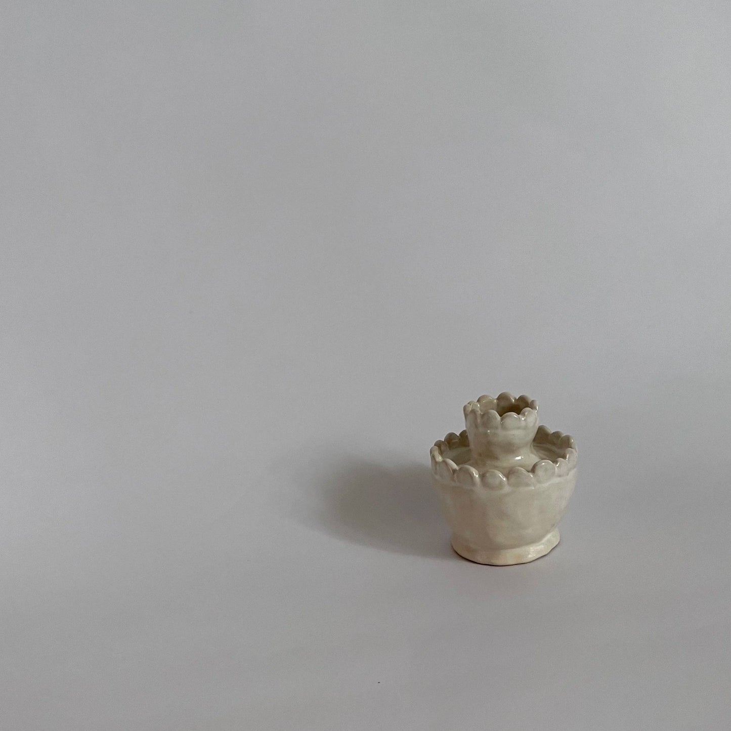 tiered scalloped candleholder