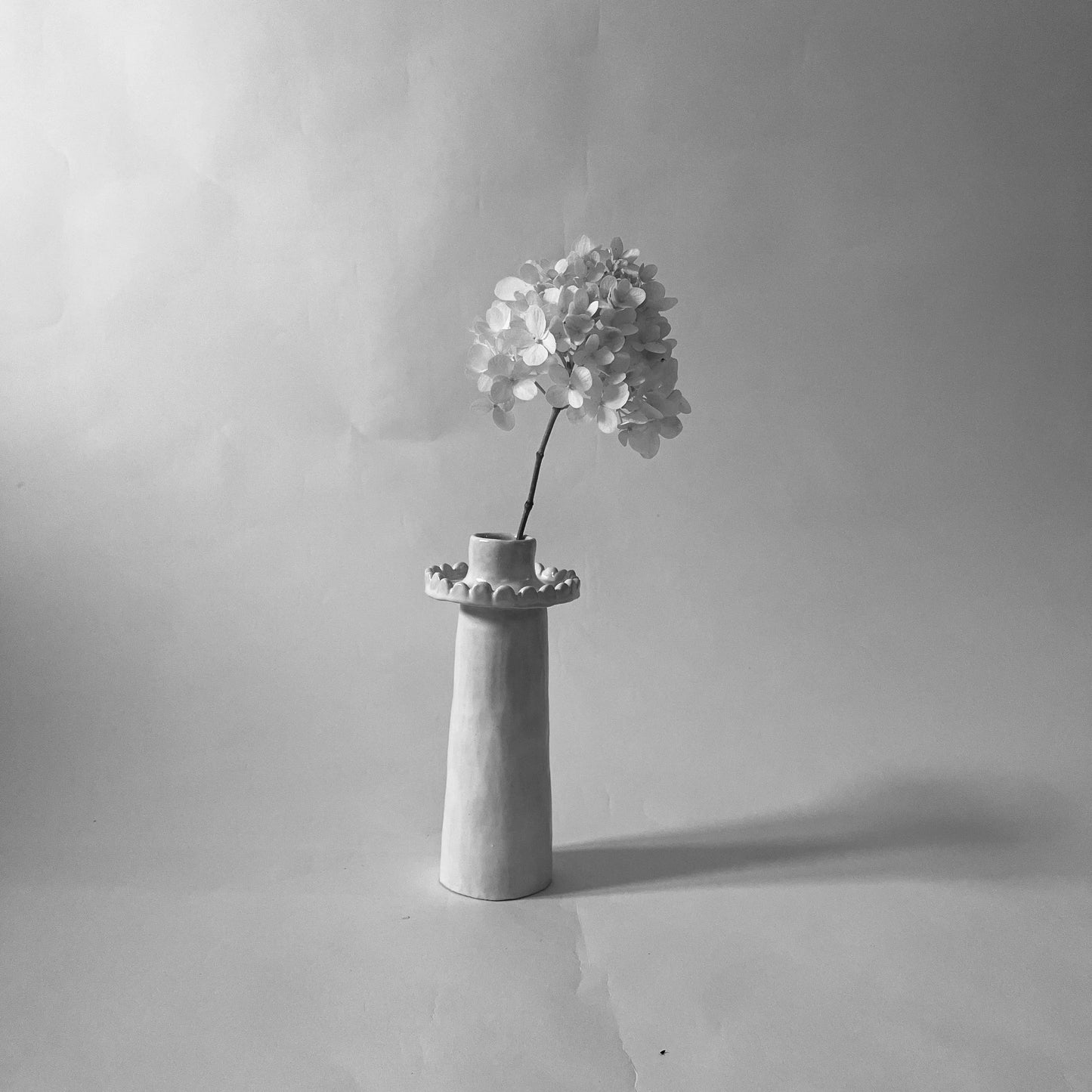 tall scalloped vase